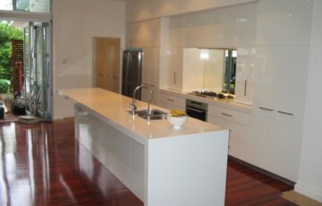 Kitchen With Caesarstone Tops and High Gloss Basins
